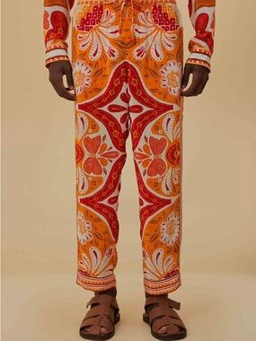Brand new with tags. FARM Rio. Size L. Orange and Red scarf print pants
